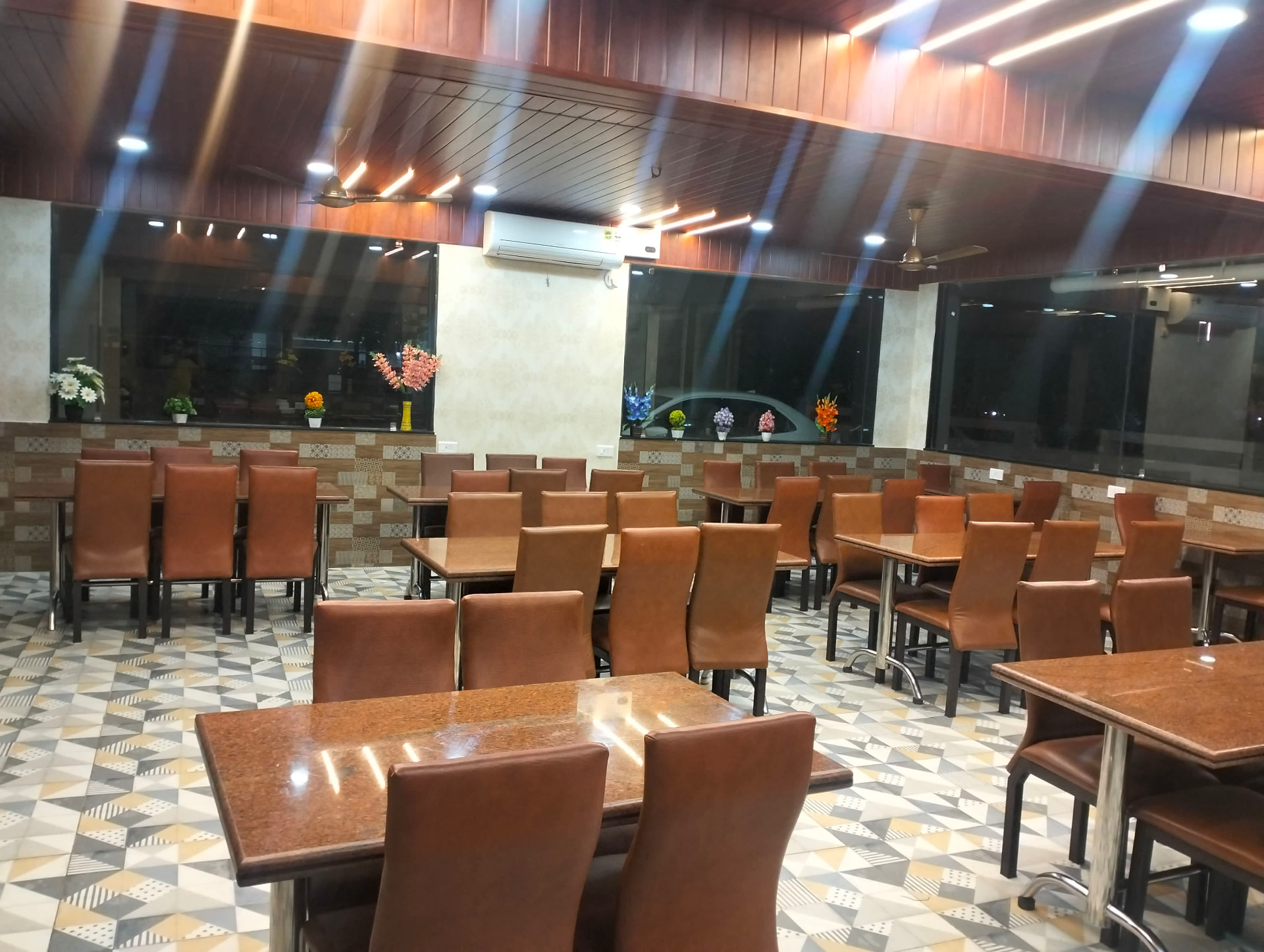 Saffron Multi Cuisine Restaurant interior with warm lighting